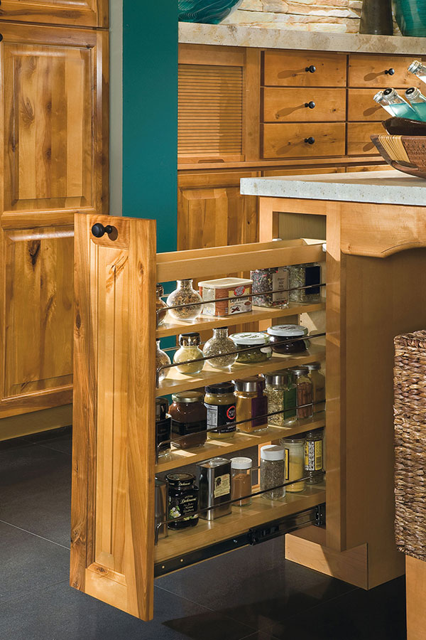 base pantry pullout cabinet stocked with spices