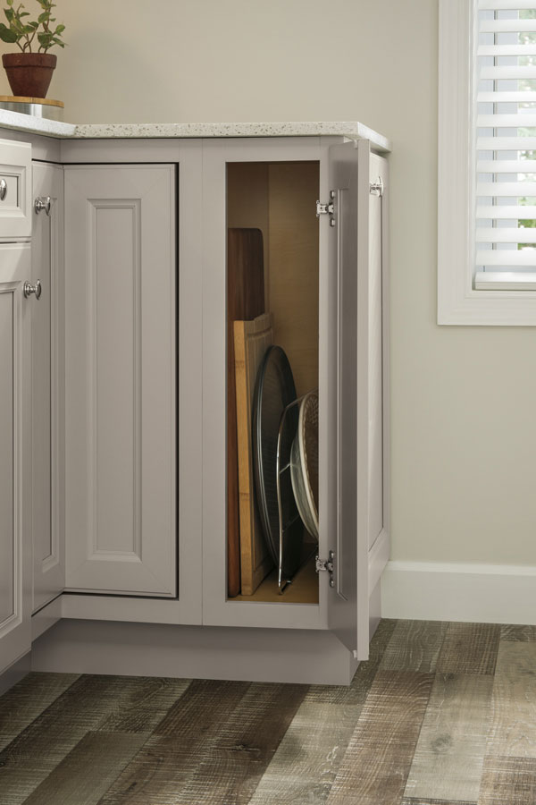 base tray divider cabinet in grey open with cutting board and baking trays inside