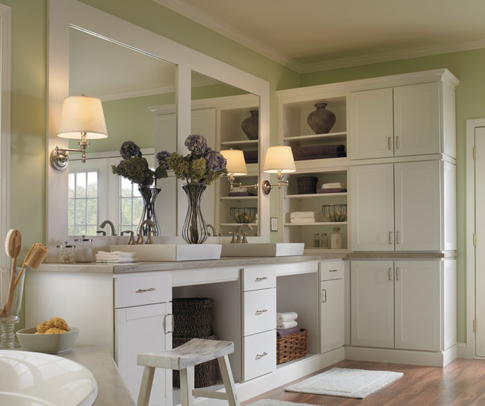 White bathroom cabinets by Aristokraft Cabinetry